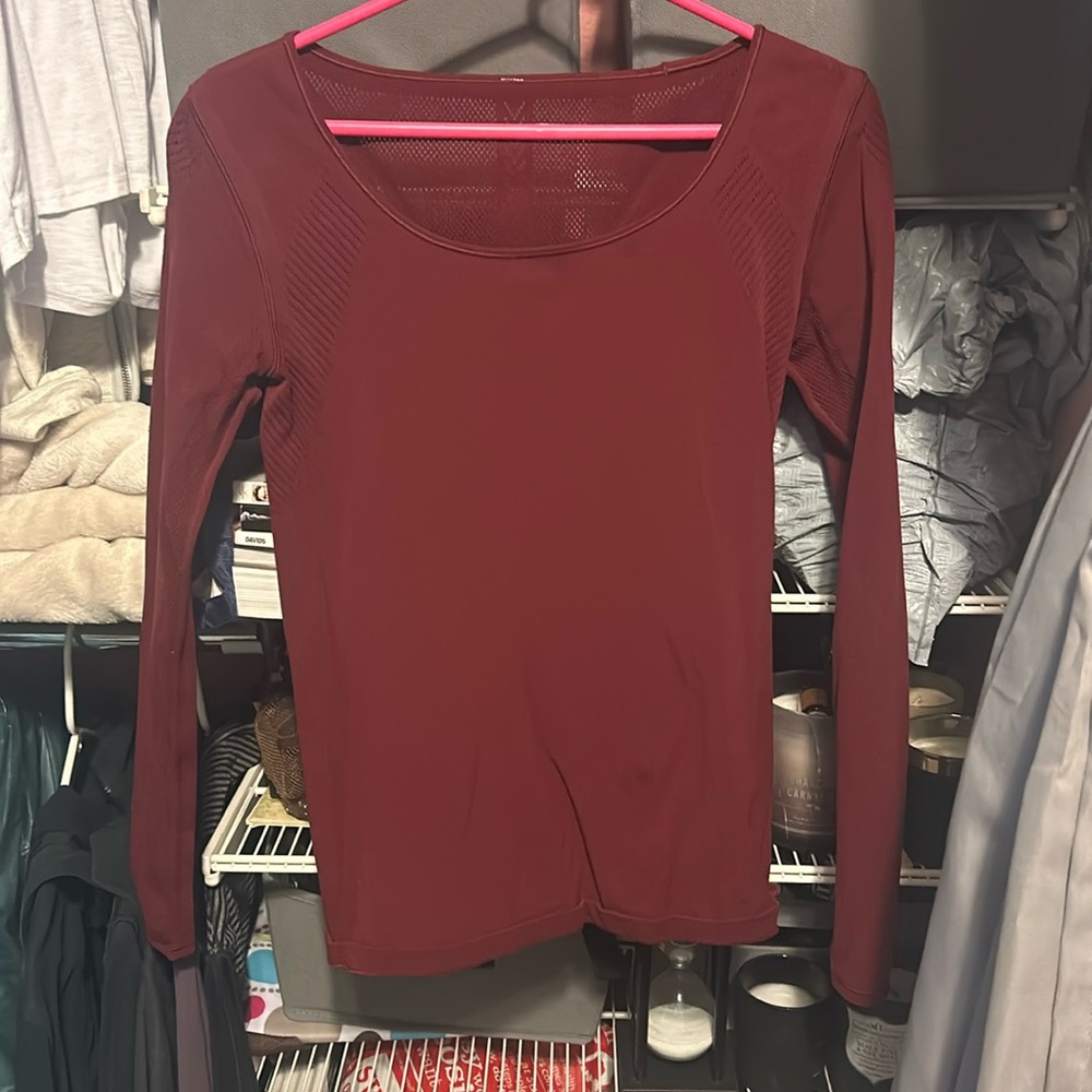 Size 12 women’s lulu shirt. Cranberry color